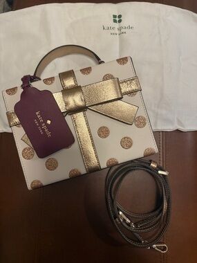 kate spade Cream and Gold Polka Dot Gift Box Crossbody with Metallic Bow